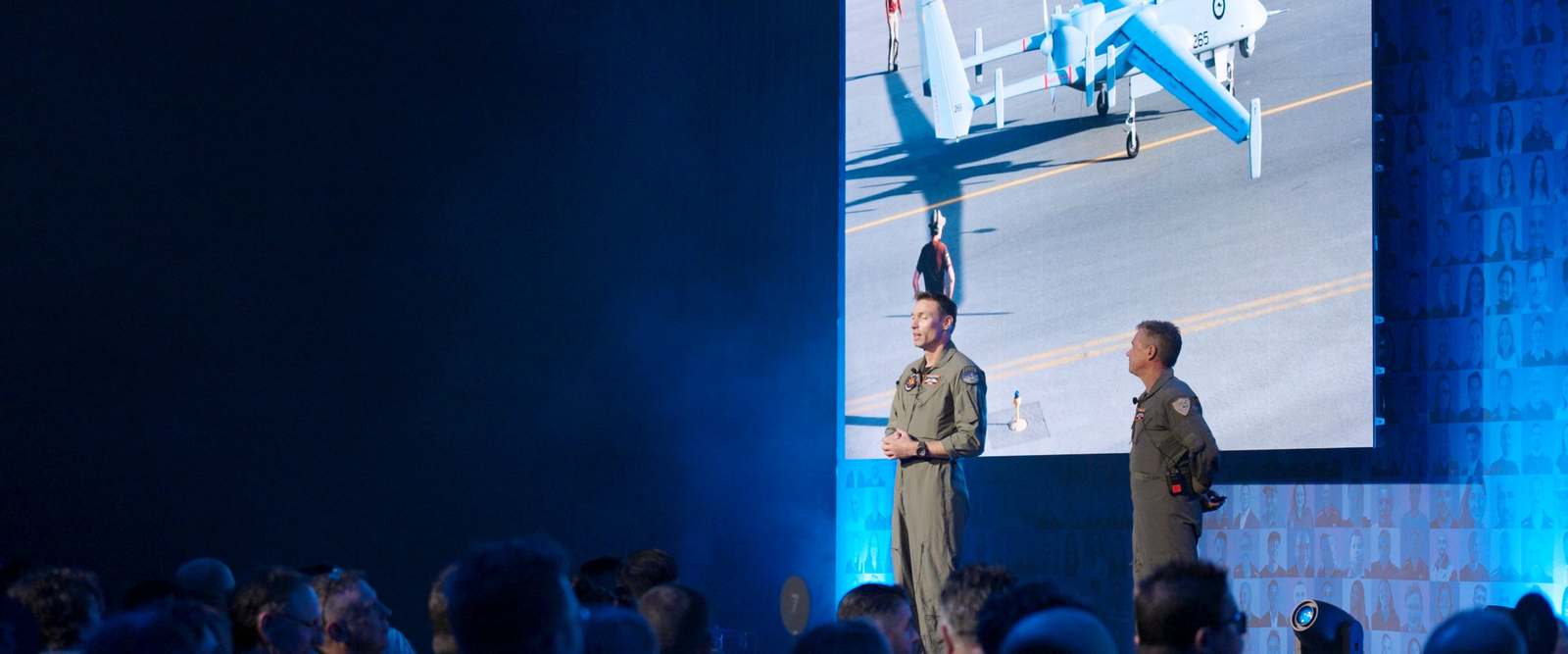 Afterburner pilots on stage during a keynote
