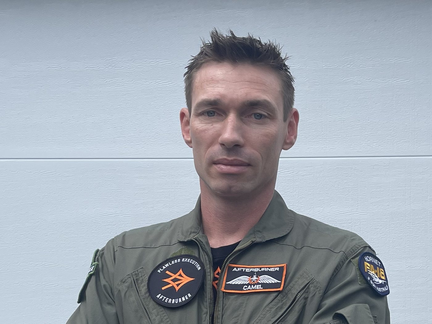 Chris 'Camel' Chmiel, Director of Afterburner Australia, in an Afterburner flight suit