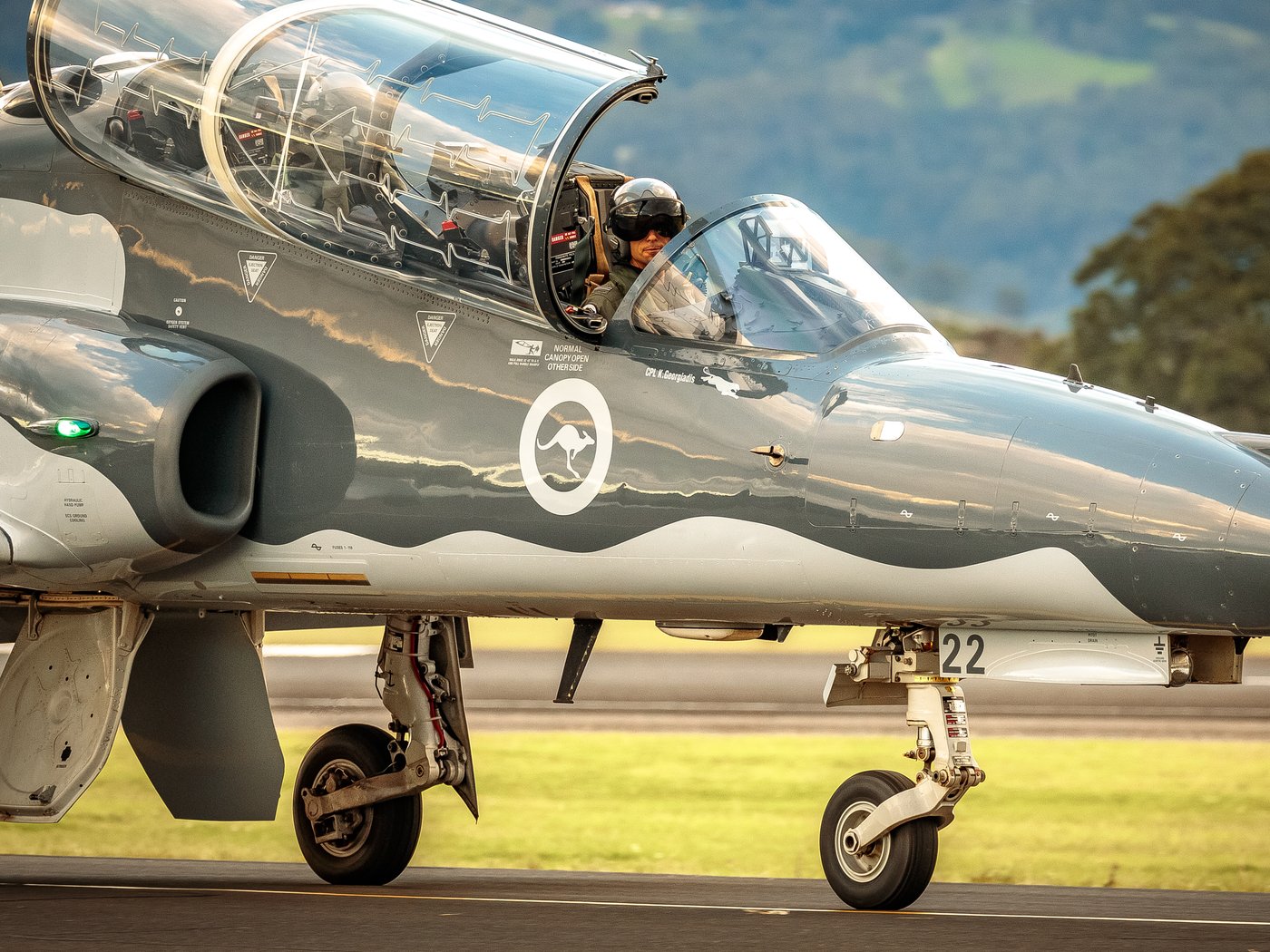RAAF Hawk 127 taxiing out with the pilot in the cockpit