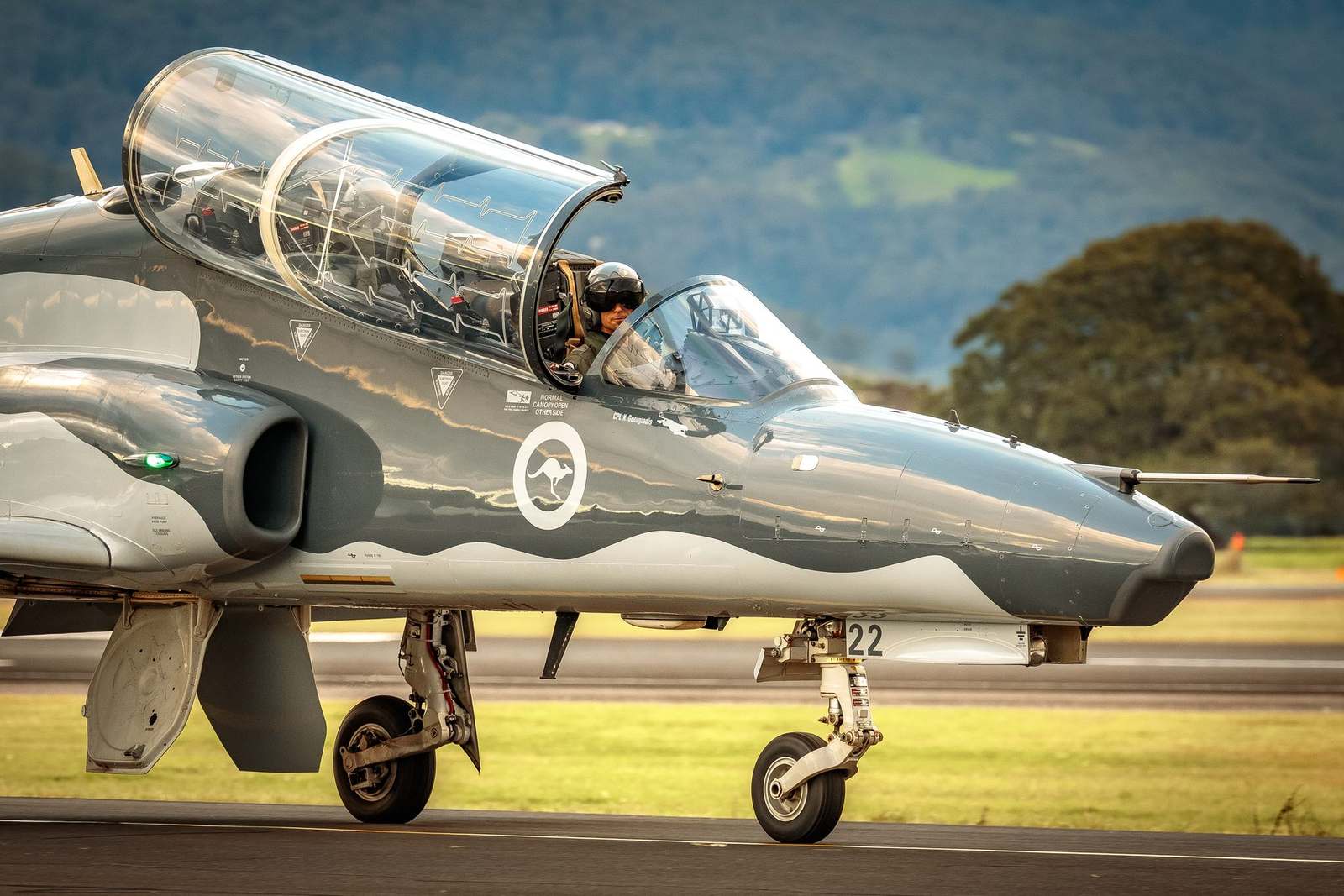 A Royal Australian Air Force Hawk taxiing on the flightline