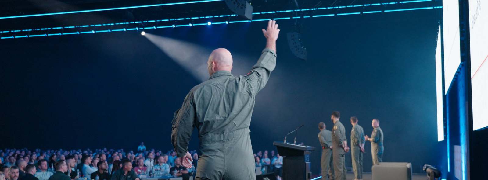An Afterburner facilitator addressing a room of delegates